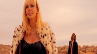 Brittany Allen is pursued by a lone zombie in It Stains the Sands Red
