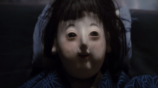 Creepy doll baby from Over Your Dead Body trailer