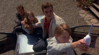 The Hess family listen in to an alien conversation in Signs 